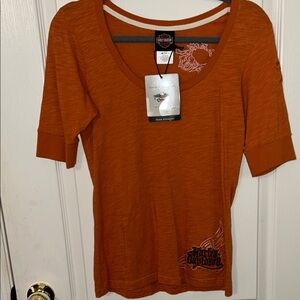 Orange Harley-Davidson Women's Top with embroidered detail on the front and back